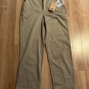 Vans khaki chinos, size 26. New with tags.